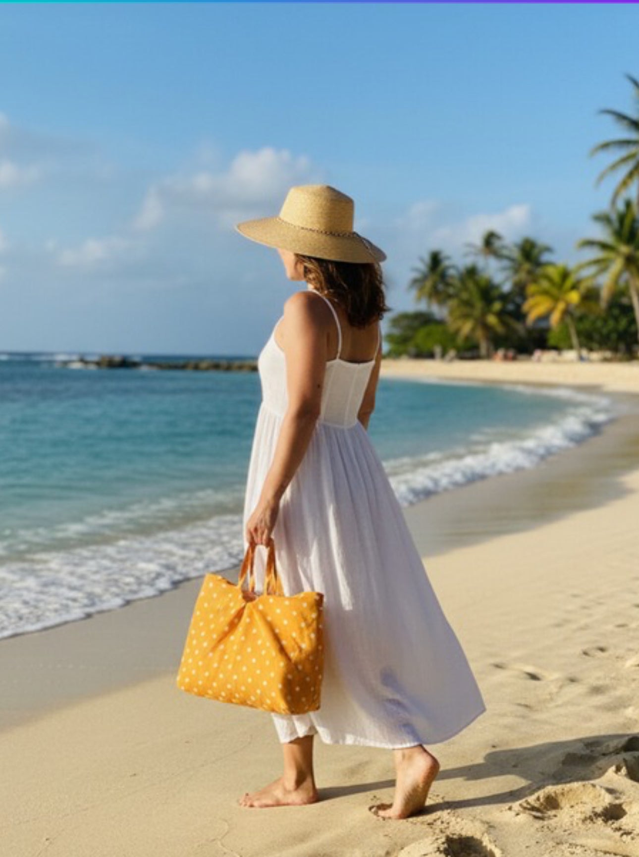 Handmade oversized yellow and white polka dot hobo bag with a wide shoulder strap. The bag features a hidden heavy-duty waterproof lining, designed by a digital artist at The Silky Way Studio UK.